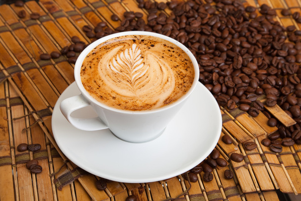 Cup of espresso coffee with a pattern on the foam - Φωτογραφία, εικόνα