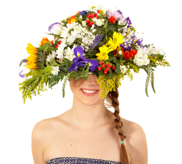 Beautiful girl with hat of flowers - Foto, Bild