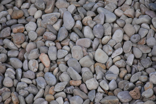mořské kameny na pláži a textury a pozadí - Fotografie, Obrázek
