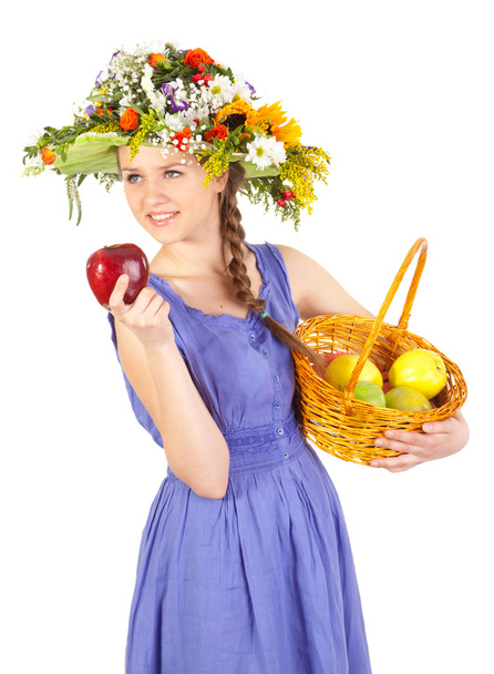 eautiful girl with flowers and apples - Photo, Image