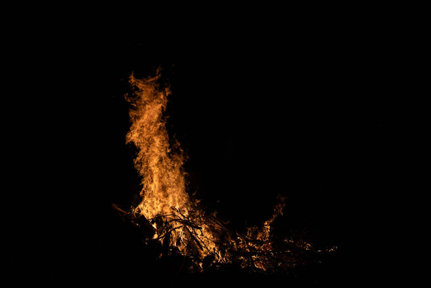 Night campfire with available space at left side. - 写真・画像