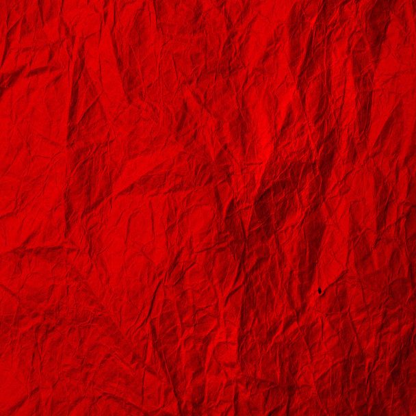 Kırmızı buruşuk kağıt. Kraft kağıdının dokusu kırmızı. Geri dönüştürülmüş kağıt arkaplanı.  - Fotoğraf, Görsel