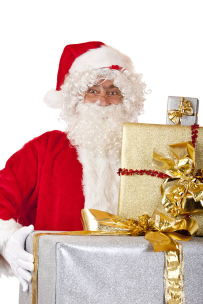 Santa Claus holding Christmas gifts - Foto, Imagem