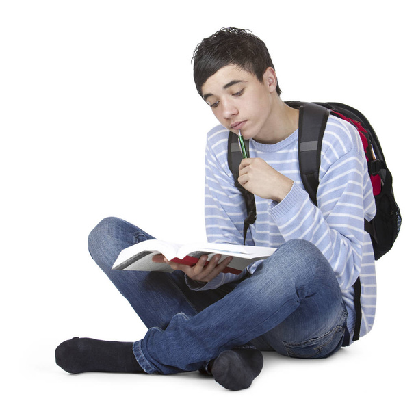 Young handsome male student learining with study book - Photo, Image