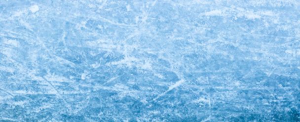Textura de gelo abstrata. Natureza fundo azul. Vestígios de lâminas de patins no gelo
 - Foto, Imagem