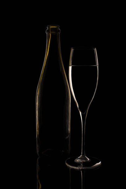 Photo glass on a black background - Фото, зображення