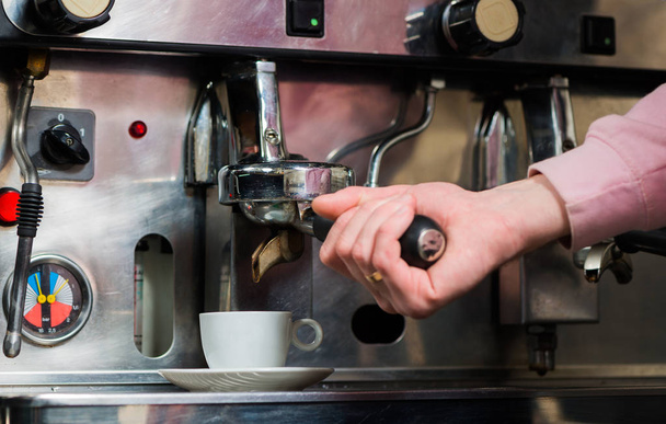 bartender making espresso in coffee mashine  - Photo, Image