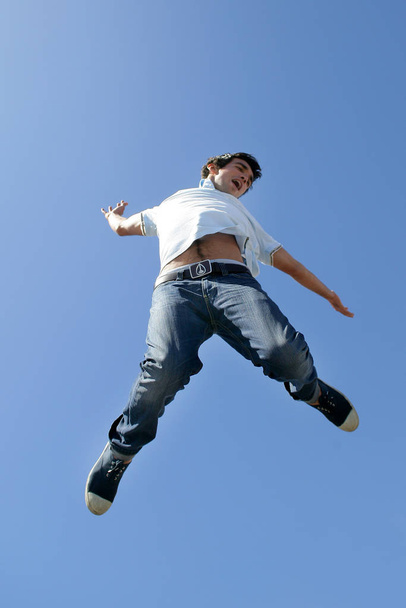 man jumping in the air face - Zdjęcie, obraz