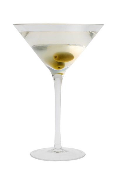 Dirty Martini mixed drink with olive garnish close up on a white background - Valokuva, kuva