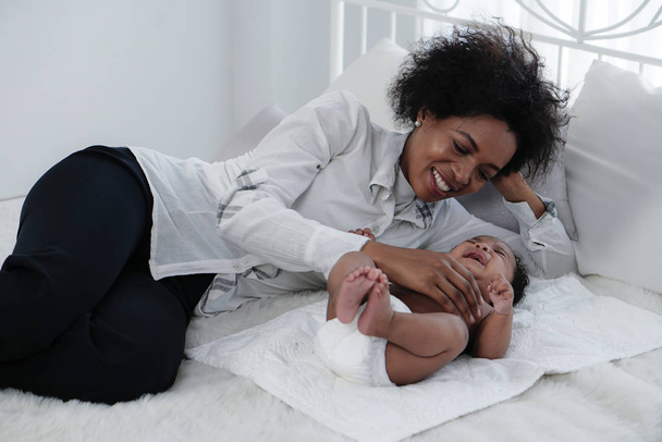 african american mother spend time with her baby boy at home - Fotografie, Obrázek