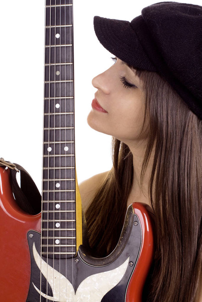 beautiful young woman with a guitar - Фото, изображение