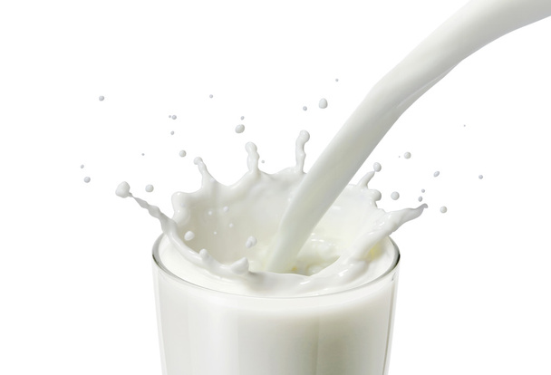 Наливання молока або білої рідини в склянку створює бризки
 - Фото, зображення