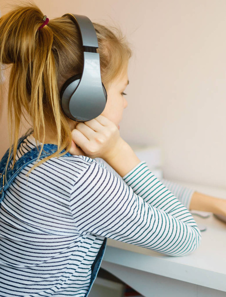 Close up peaceful woman in headphones enjoying favorite music or audiobook - Foto, imagen