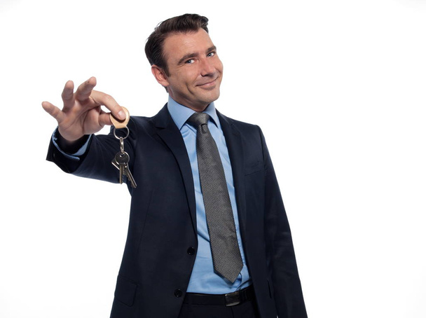 Man Businessman realtor offering keys - Zdjęcie, obraz