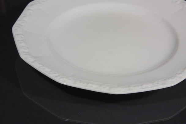 empty white plate on black background - Photo, Image