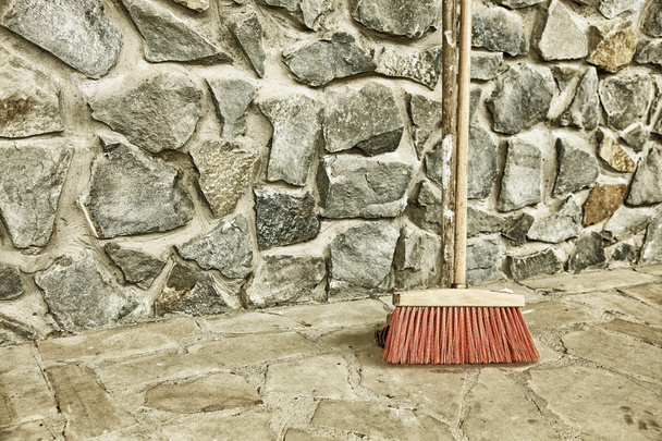 large broom on wall outdoor - housework - Photo, Image