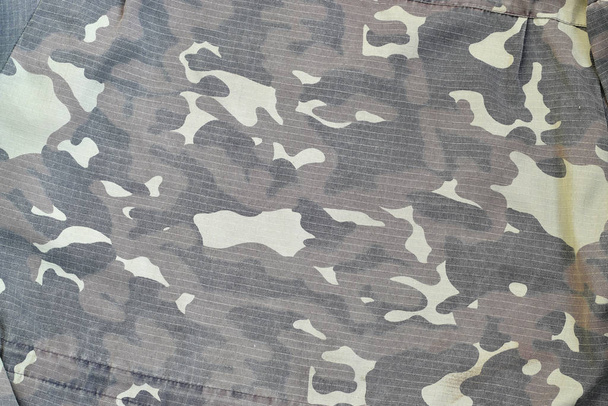 Camouflage background texture as backdrop for paintball and airsoft strikeball design projects - Photo, Image
