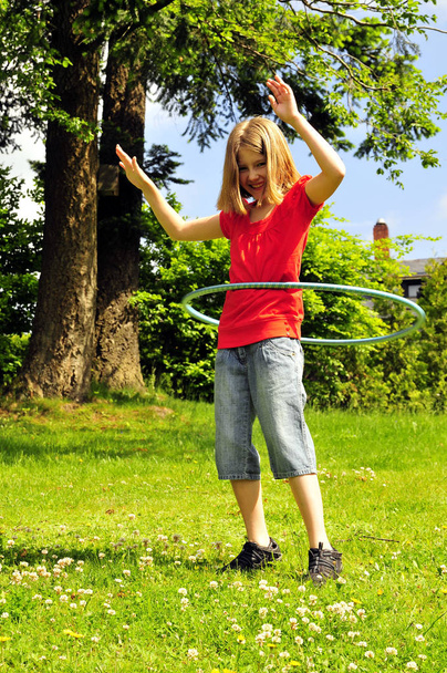child in the garden jumping jumping - Fotó, kép