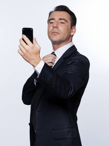 Handsome business man phoning - Photo, image