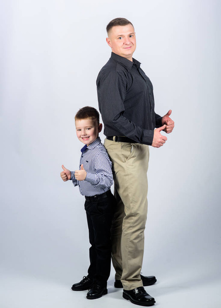 little boy with dad businessman. happy child with father. business partner. family day. childhood. parenting. fathers day. father and son in business suit. businessman. two businessman with success - Photo, image