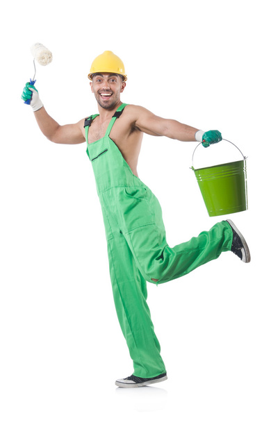 Painter in green coveralls on white - Фото, зображення