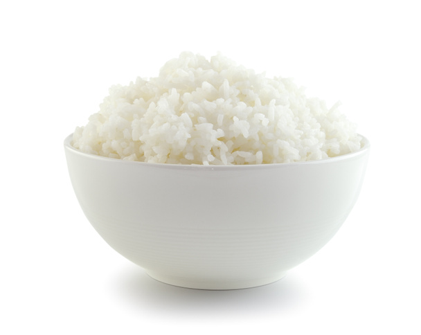 rizs egy tálban, fehér alapon - Fotó, kép