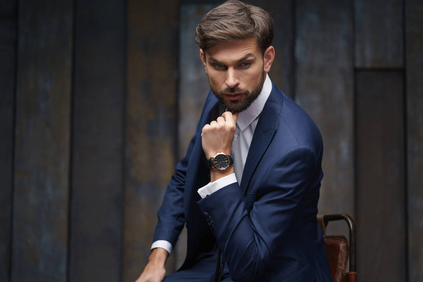 indoor photo of young handsome stylish businessman wearing suit - Fotografie, Obrázek