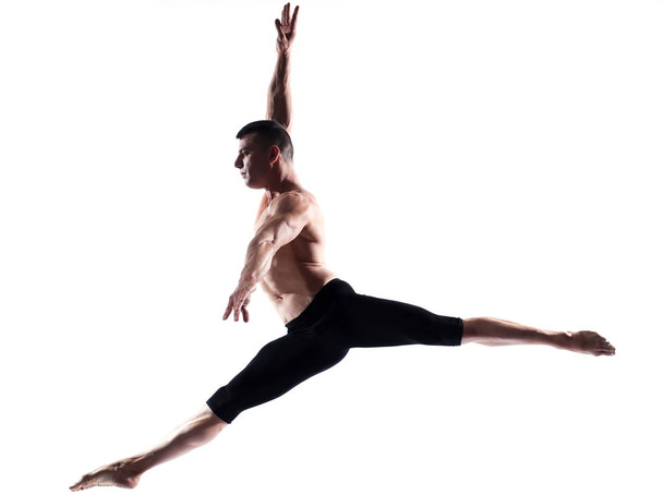 Man portrait gymnastic jump - Foto, imagen