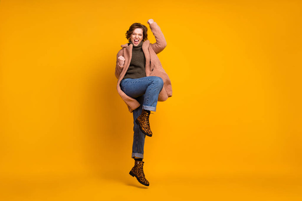Full length body size view of her she nice attractive lovely pretty overjoyed cheerful cheery girl celebrating attainment isolated over bright vivid shine vibrant yellow color background - Fotoğraf, Görsel