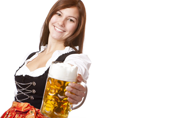 bavarian woman with oktoberfest beer measure - 写真・画像