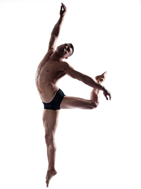 Man portrait gymnastic  jump - Foto, imagen