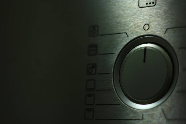 Button on a modern stove. - Fotoğraf, Görsel