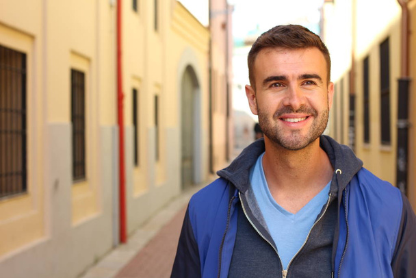 close-up portrait of handsome young man in casual clothes on street - Φωτογραφία, εικόνα