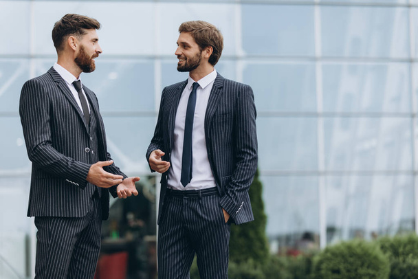 Two businessmen discussing together - Photo, image