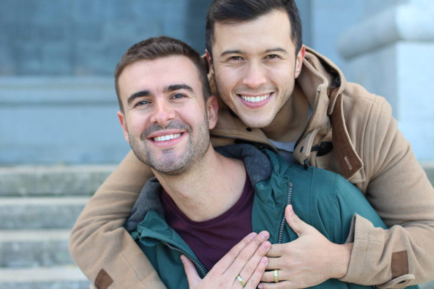 Homosexual couple outdoors with copy space - 写真・画像