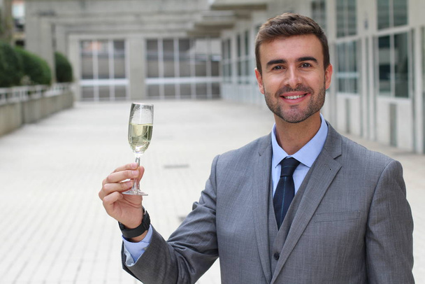 Businessman cheering with champagne glass - Foto, Imagem