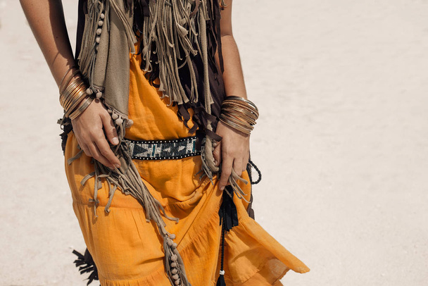cropped image of bohemian style woman details - Foto, afbeelding