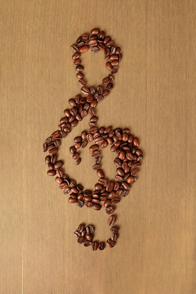 Chef de grain de café sur fond en bois
 - Photo, image