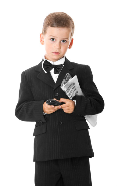 Boy holding a cellphone and newspaper - Fotó, kép