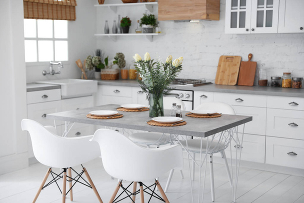 Beautiful kitchen interior with new stylish furniture - Foto, Imagen