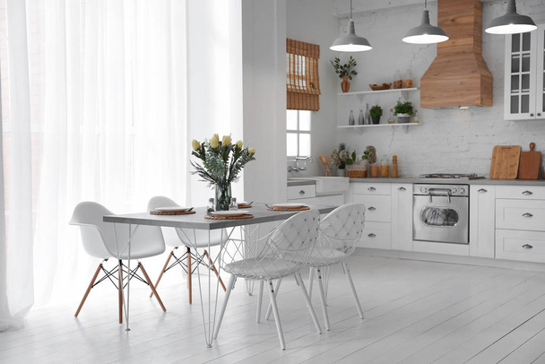 Beautiful kitchen interior with new stylish furniture - Foto, imagen