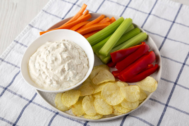 Homemade Caramelized Onion Dip with Potato Chips, Celery, Pepper - Photo, Image