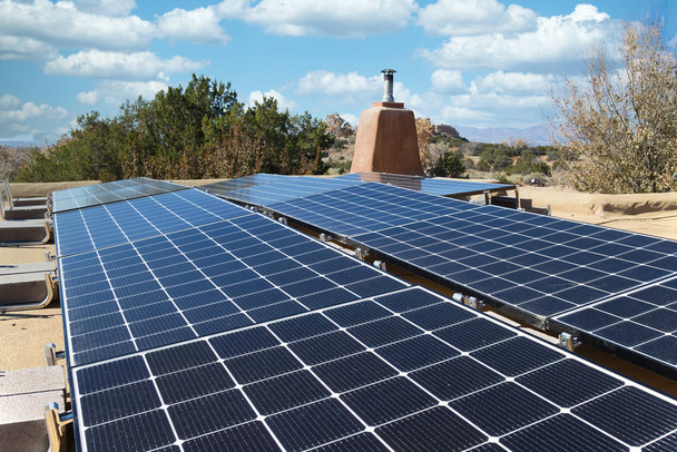 Solar panel installation on a flat New Mexico roof, in horizontal format - Photo, Image