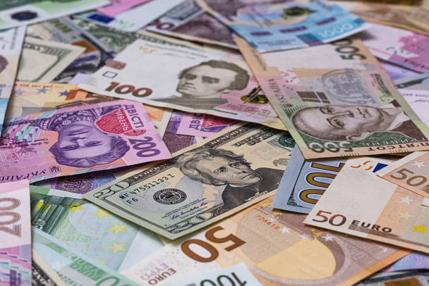 Closeup of dollar, euro and hryvnia banknotes  - Photo, Image