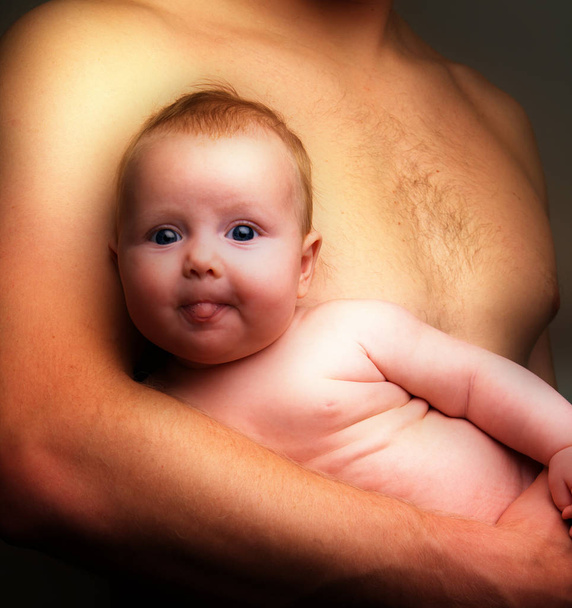 Baby Held By Father - 写真・画像
