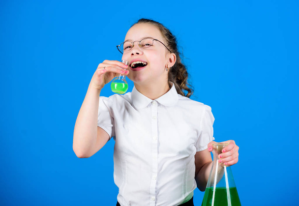 science research in lab. Small school girl. small smart girl with testing flask. child study bilogy lesson. education and knowledge. back to school. In search of right medical solution - Фото, зображення