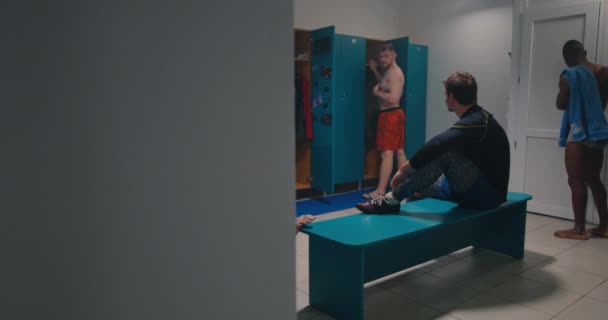 Men bullying in locker room - Footage, Video