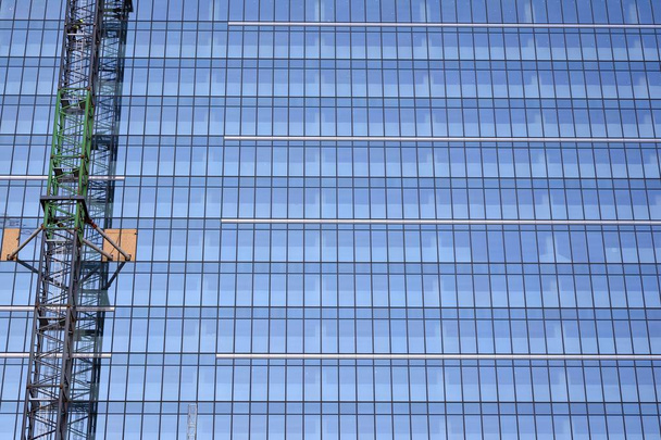 Reflexão abstrata das fachadas de vidro da cidade moderna
 - Foto, Imagem