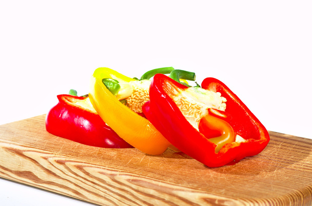 Slices of red and yellow bell pepper - Photo, Image