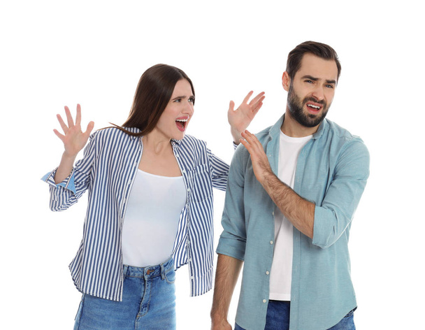 Couple quarreling on white background. Relationship problems - Foto, afbeelding